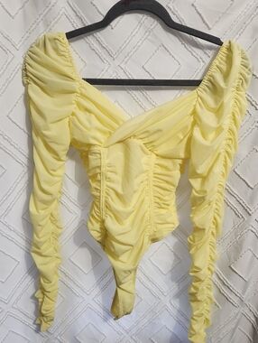 Fashion Nova Yellow Ruched Long Sleeve Bodysuit